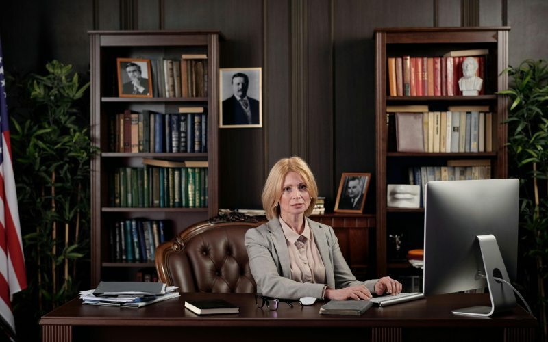 lawyer sitting at desk 